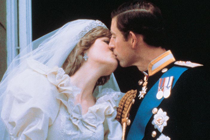 One of the most iconic kisses in 20th century history as the newlywed Prince and Princess of Wales kiss on the balcony of Buckingham Palace.